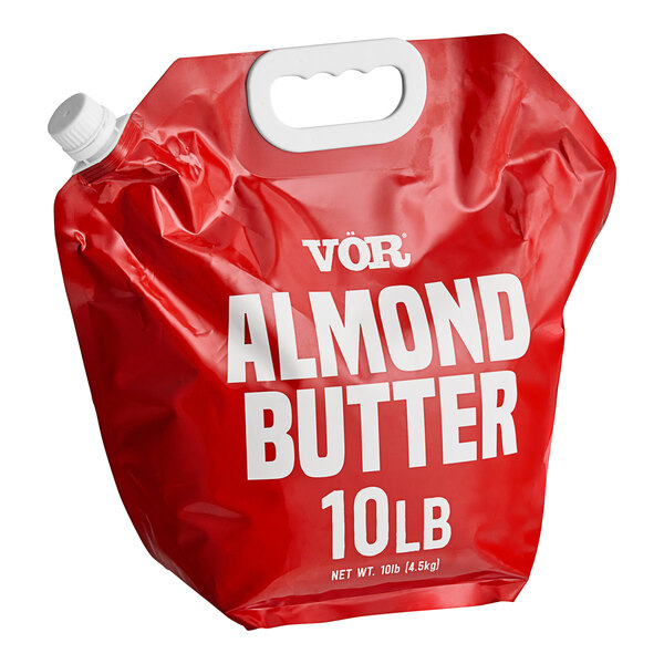 A red plastic pouch of Vor Almond Butter with white text.