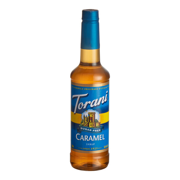 A 750 mL plastic bottle of Torani Sugar-Free Caramel Flavoring Syrup with a blue label.