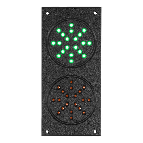 A black rectangular traffic light with green and white lights.