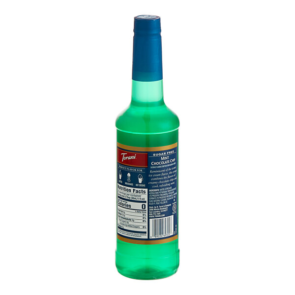 A green Torani bottle of liquid with a green lid.