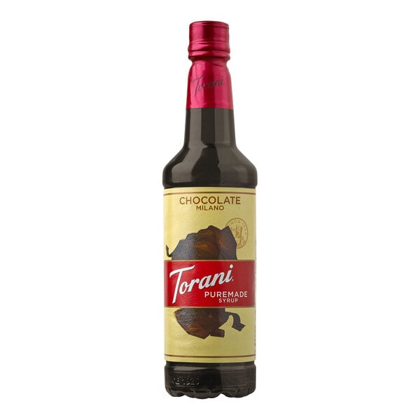 A Torani Chocolate Milano flavoring syrup bottle with a yellow label.