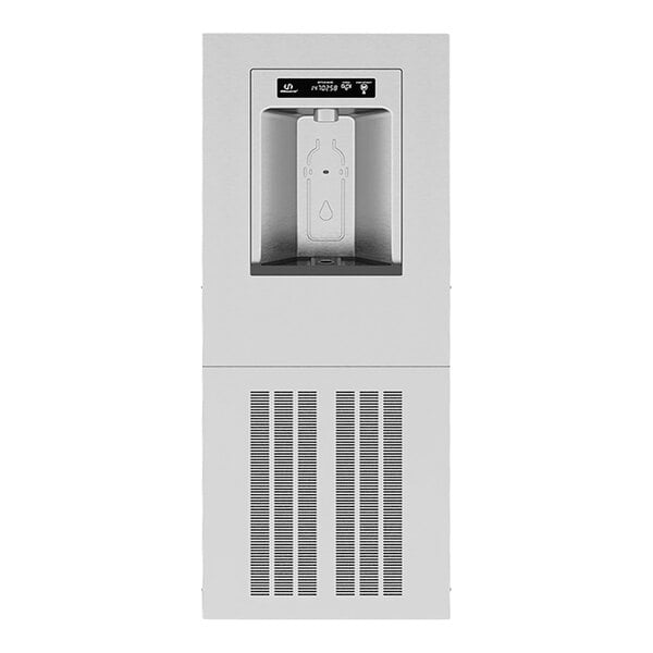 A Haws stainless steel recessed bottle filler with a water bottle inside.