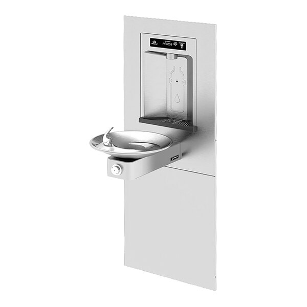 A stainless steel Haws Recessed Bottle Filler with a drinking fountain.