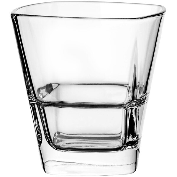 A Libbey stackable rocks glass with a square bottom on a white background.