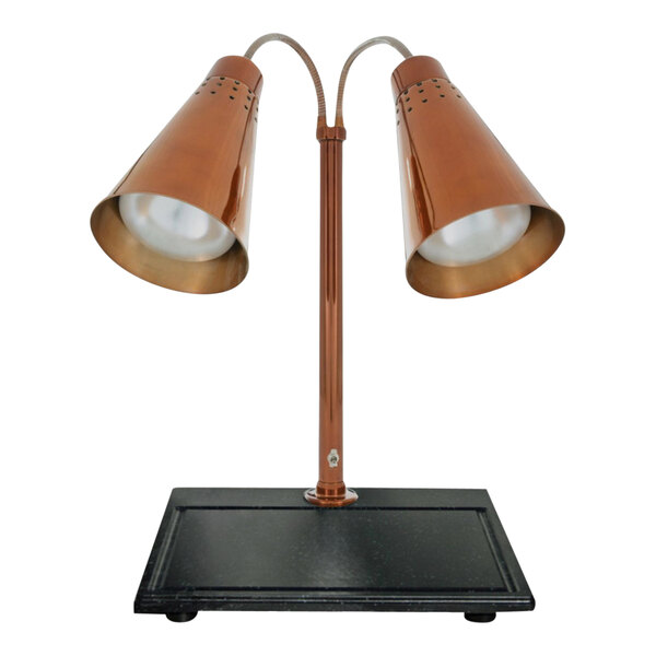 A Hanson Heat Lamps carving station with a copper base holding two rectangular copper lamps.