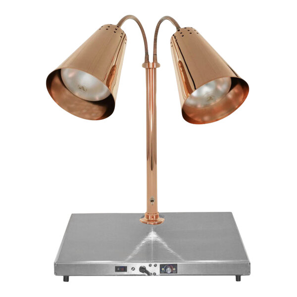 A copper Hanson Heat Lamps carving station base with two lamps on a metal surface.