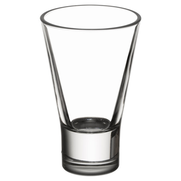 A close-up of a clear Libbey tall shot glass.