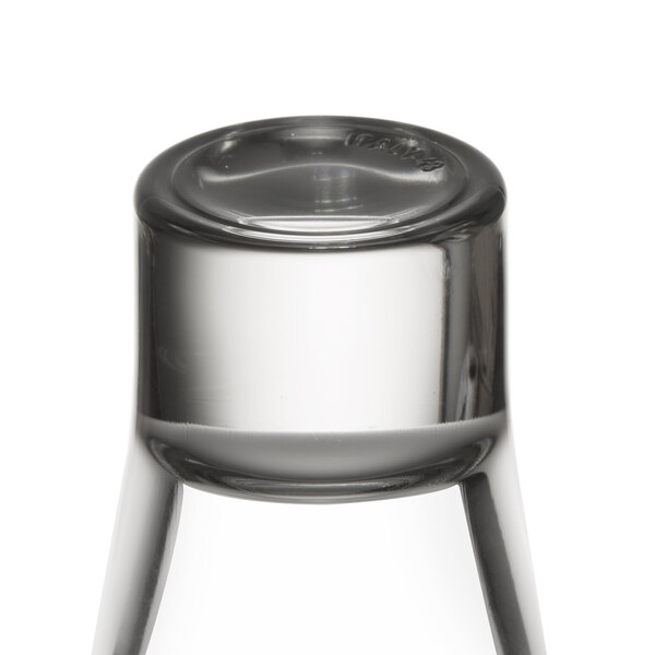 A close up of a Libbey tall shot glass.