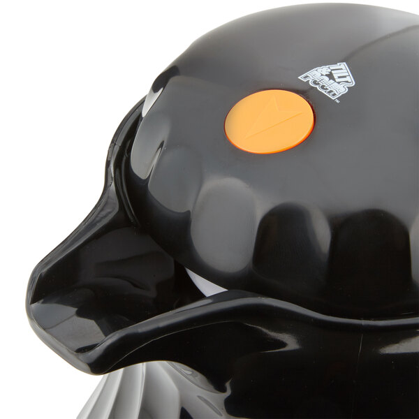 A black plastic Vollrath beverage server on a table with a yellow circle on top.
