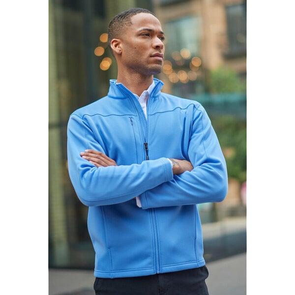 A man in a blue Edwards fleece jacket with a full zip.
