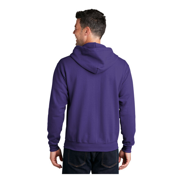 A man wearing a purple Port & Company full-zip hoodie.
