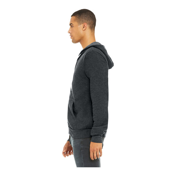 A person wearing a dark gray Bella + Canvas full-zip hoodie.