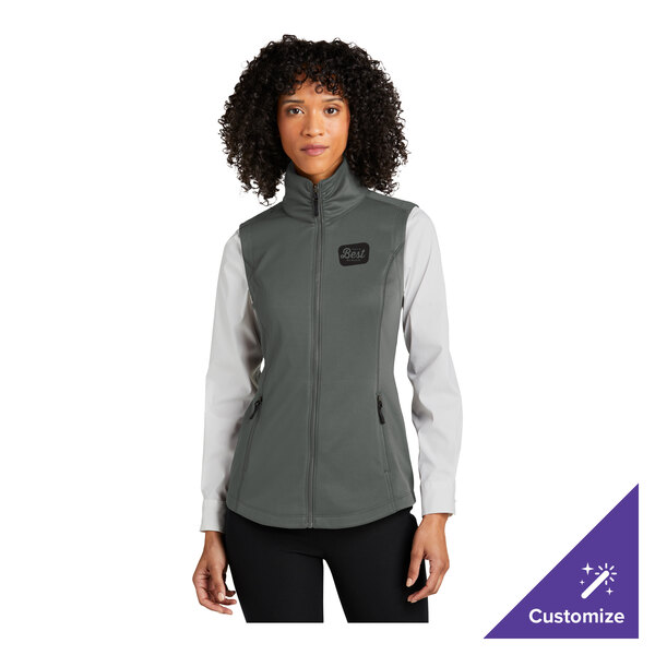 A women's graphite-colored fleece vest with a front zipper and customizable patch, shown in size large.