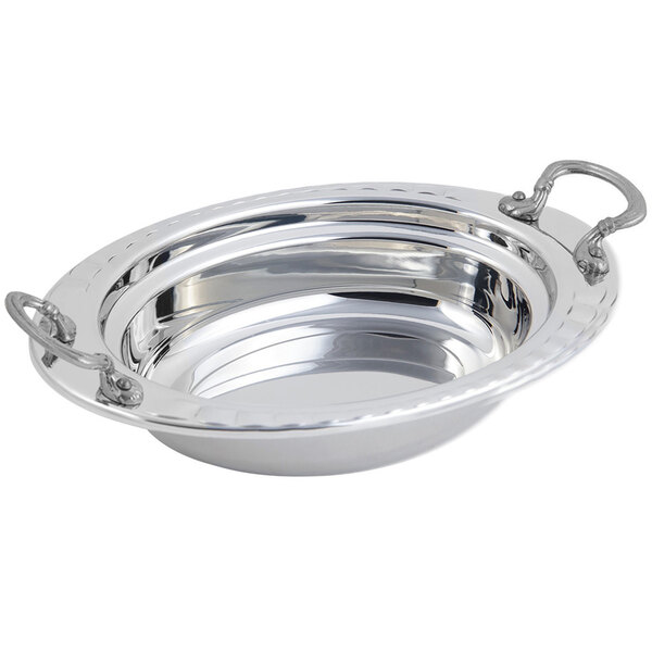 A stainless steel oval food pan with round stainless steel handles.