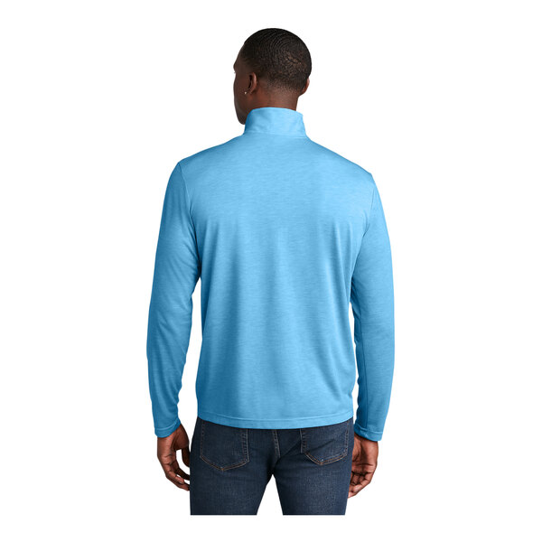 A man wearing a Sport-Tek Pond Blue Heather quarter-zip pullover.