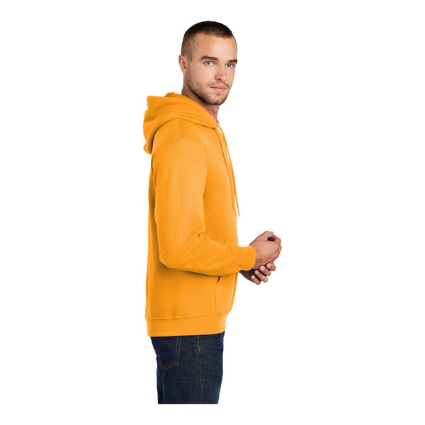 A gold Port & Company Core Fleece Pullover Hoodie sweatshirt.