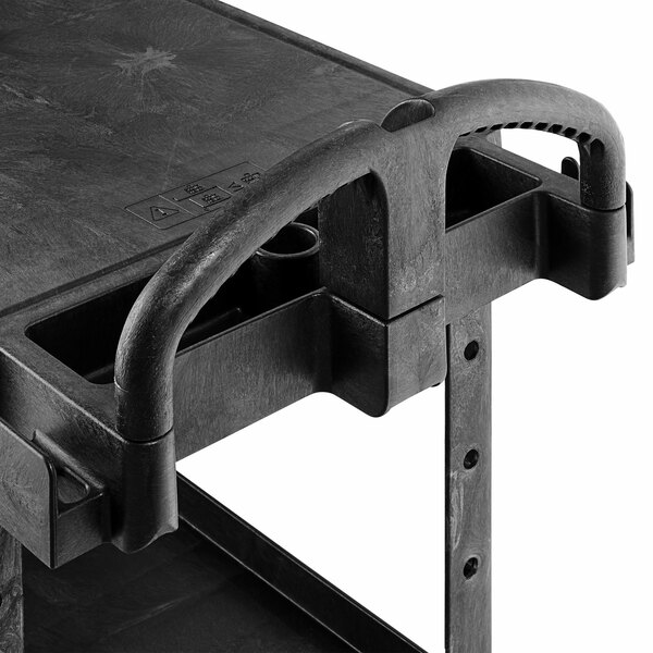 A black Rubbermaid plastic utility cart with two shelves and an ergonomic handle.