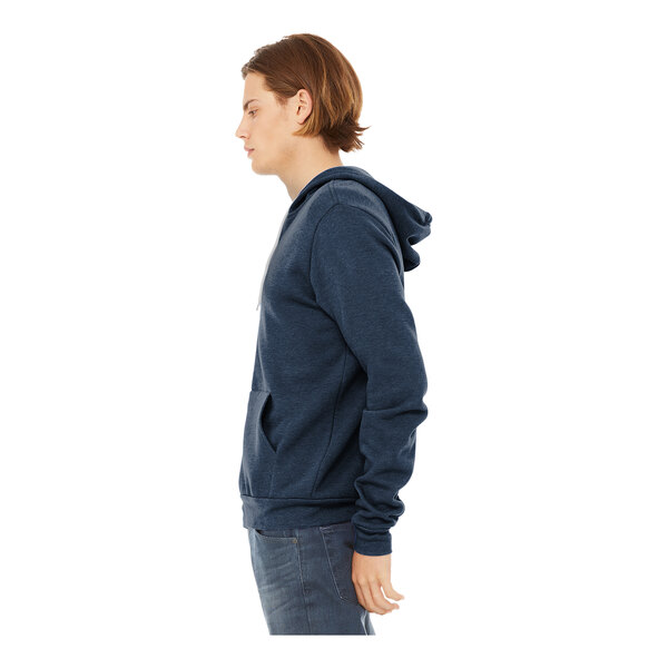 A man wearing a Bella + Canvas heather navy blue full-zip sweatshirt with a hood.