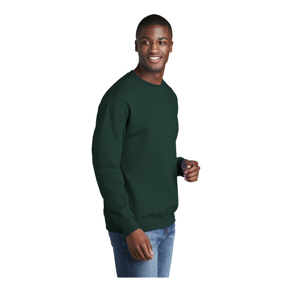 A man wearing a dark green Port & Company Core Fleece sweatshirt.