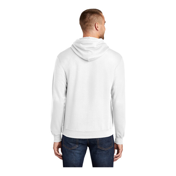 A man wearing a white Port & Company fleece pullover hoodie.