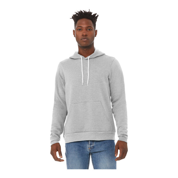 A man wearing a Bella + Canvas athletic heather grey sweatshirt.