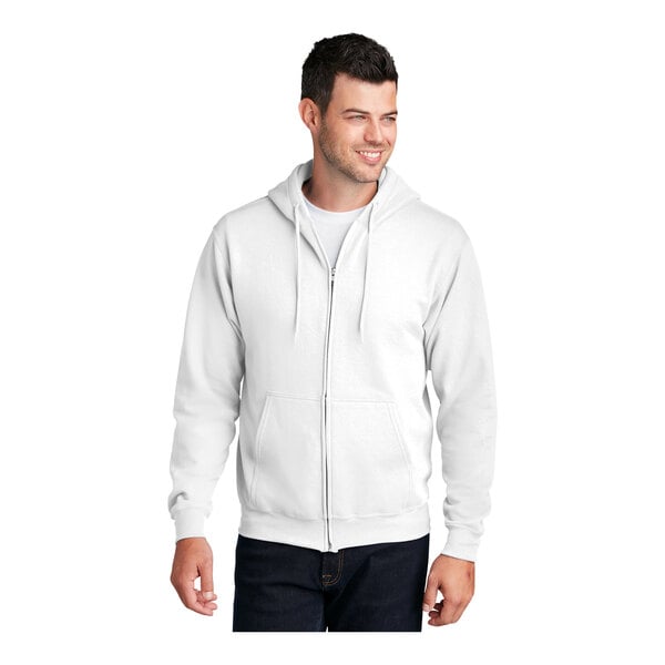 A man in a white Port & Company full-zip hoodie.
