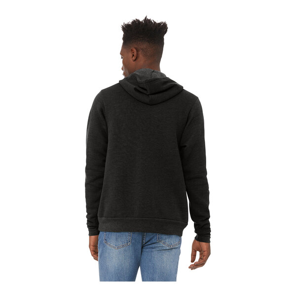 A man wearing a Bella + Canvas black sponge fleece hoodie.