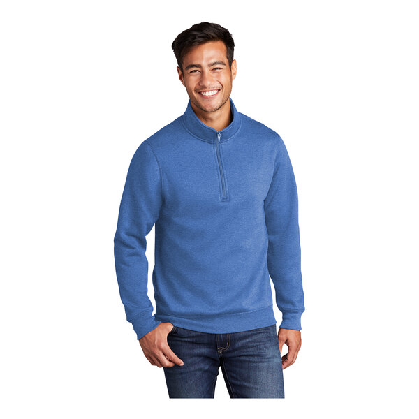 A man wearing a Port & Company heather royal blue quarter-zip sweatshirt.