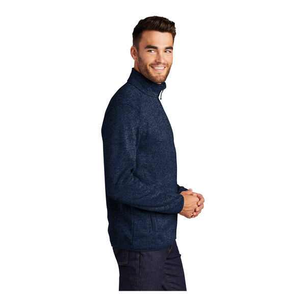 A man wearing a River Blue Port Authority fleece sweater jacket with a navy heather trim and full-zip closure.