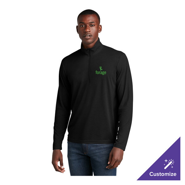 A black unisex quarter-zip pullover sweatshirt with long sleeves and a small green 'forage' logo on the chest.