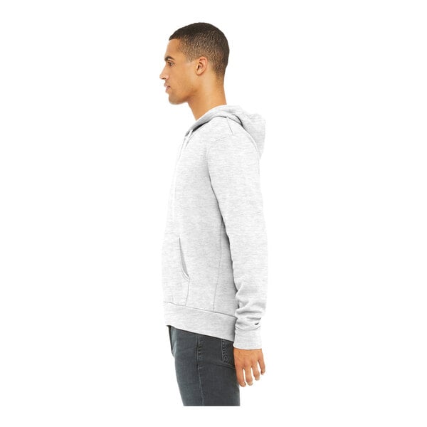 A man wearing a Bella + Canvas ash grey full-zip hoodie.