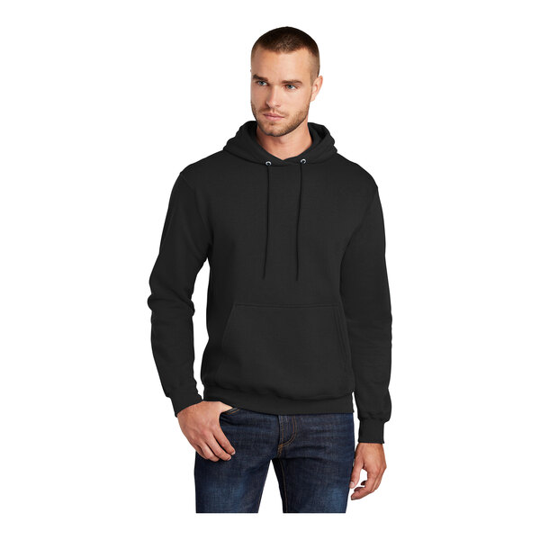 A man wearing a black Port & Company Core Fleece pullover hoodie.