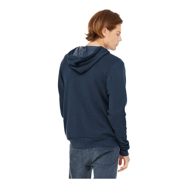 A man wearing a blue Bella + Canvas full-zip hoodie.
