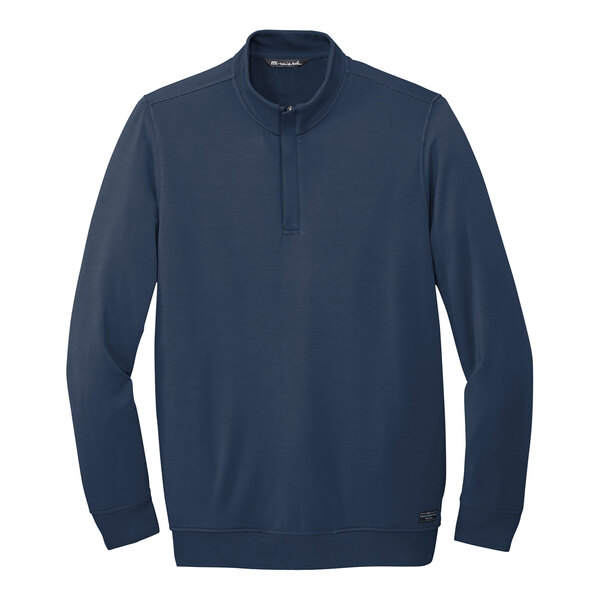 A TravisMathew blue fleece quarter-zip pullover.
