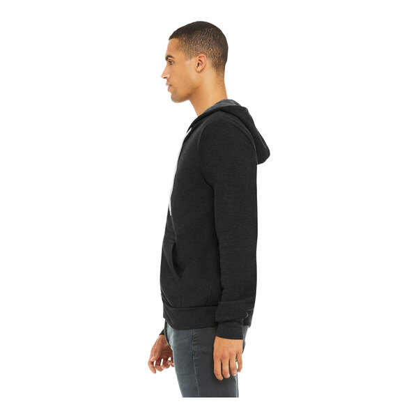 A person wearing a black Bella + Canvas Sponge Fleece full-zip hoodie.