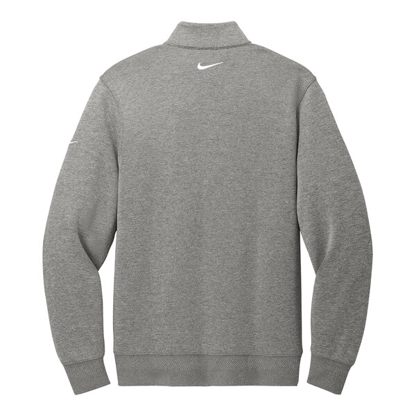 A grey Nike Dri-FIT half-zip sweater with a white swoosh on it.