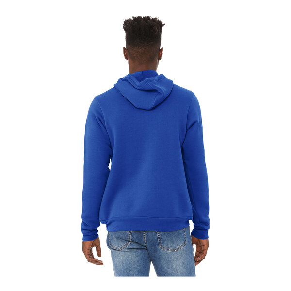 A man wearing a blue Bella + Canvas sponge fleece pullover hoodie.