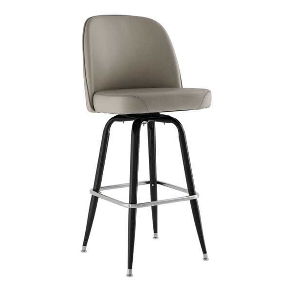A Lancaster Table & Seating black barstool with a gray vinyl seat.