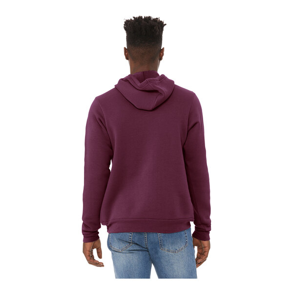 A man wearing a maroon Bella + Canvas Sponge Fleece hoodie.