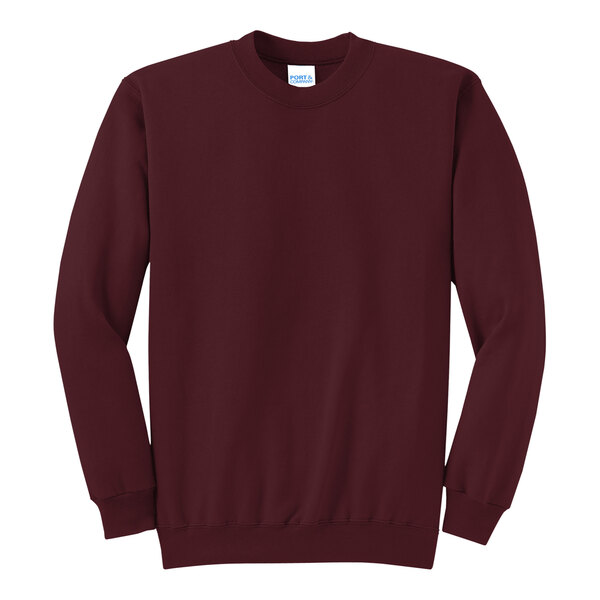 A maroon Port & Company core fleece crewneck sweatshirt.