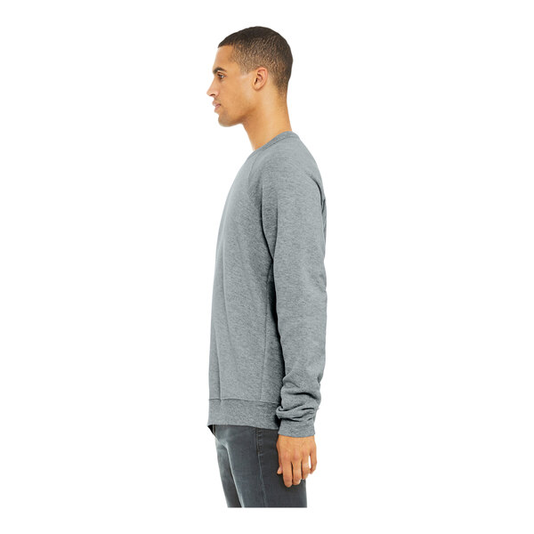 A man in an extra large Bella + Canvas grey raglan sweatshirt.