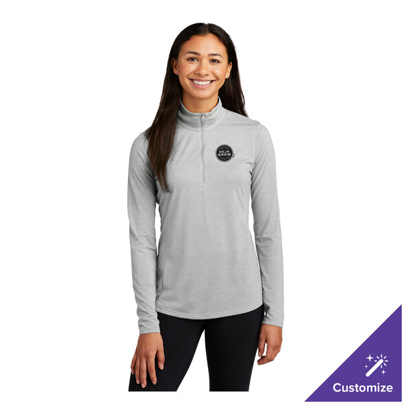 A women's light gray heather quarter-zip pullover sweatshirt in a tri-blend fabric, featuring a customizable logo on the chest.