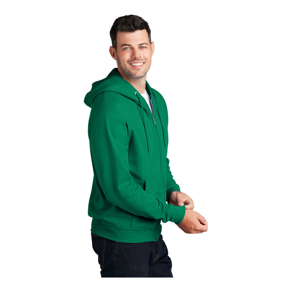 A man wearing a Port & Company full-zip hoodie in kelly green.