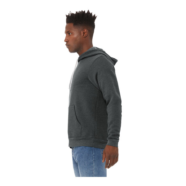 A man wearing a dark gray Bella + Canvas sponge fleece pullover hoodie.
