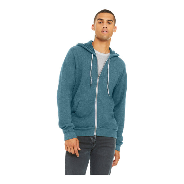 A man wearing a Bella + Canvas heather deep teal zip-up hoodie.