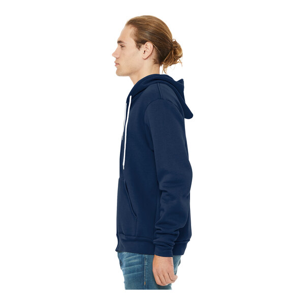 A person wearing a navy Bella Canvas hoodie.