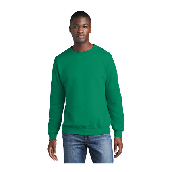 A man wearing a green Port & Company fleece crewneck sweatshirt.