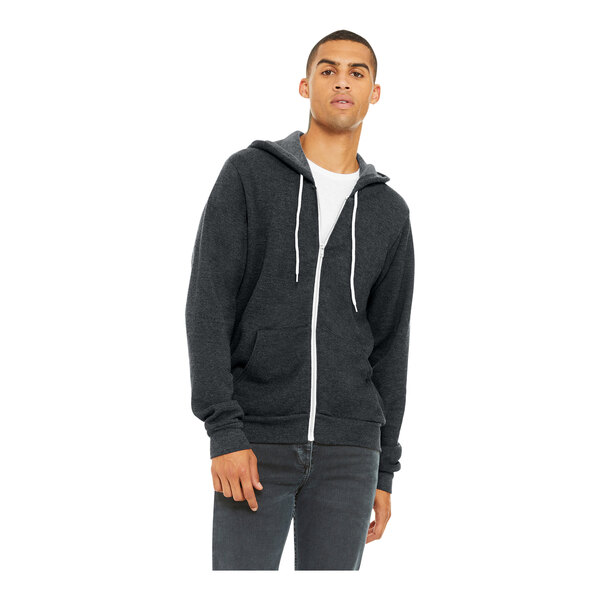 A person wearing a dark gray Bella + Canvas zip up hoodie.