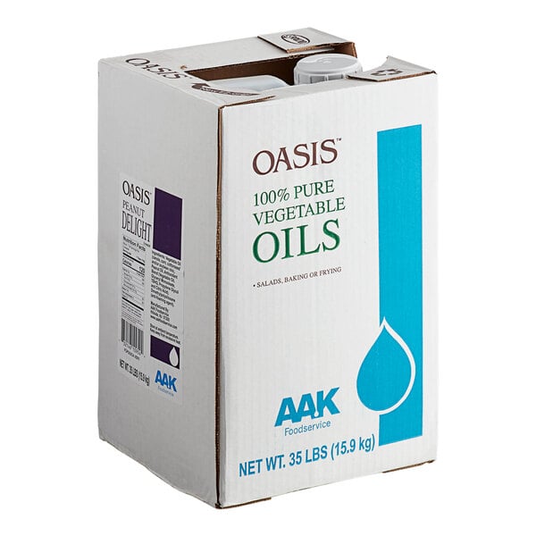 A large white box labeled 'OASIS 100% Pure Vegetable Oils' with a blue droplet graphic and a visible plastic spout on top.