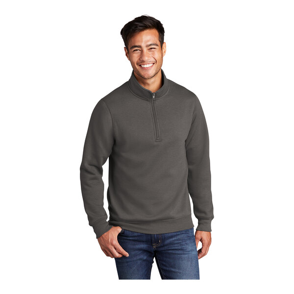 A man wearing a Port & Company charcoal quarter-zip pullover.